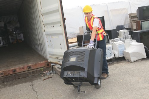 Recyclable materials being sorted for business waste management